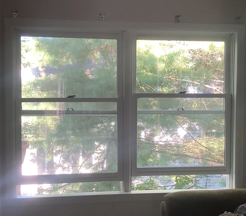 Double Hung windows separated by mullion